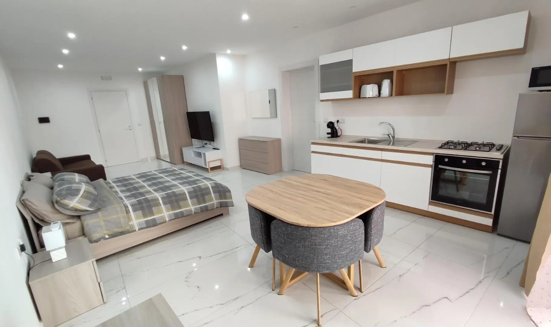 Апартаменты Il-Girna- Modern Seaside Accommodation Марсаскала Мальта